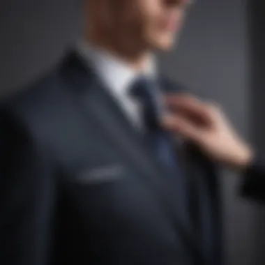 Close-up of skilled tailor adjusting the fit of a tailored suit jacket