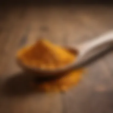 Anti-Inflammatory Properties of Turmeric Turmeric Powder in a Wooden Spoon
