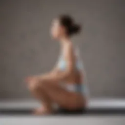 A person performing a seated forward bend stretch to ease lower back tension.