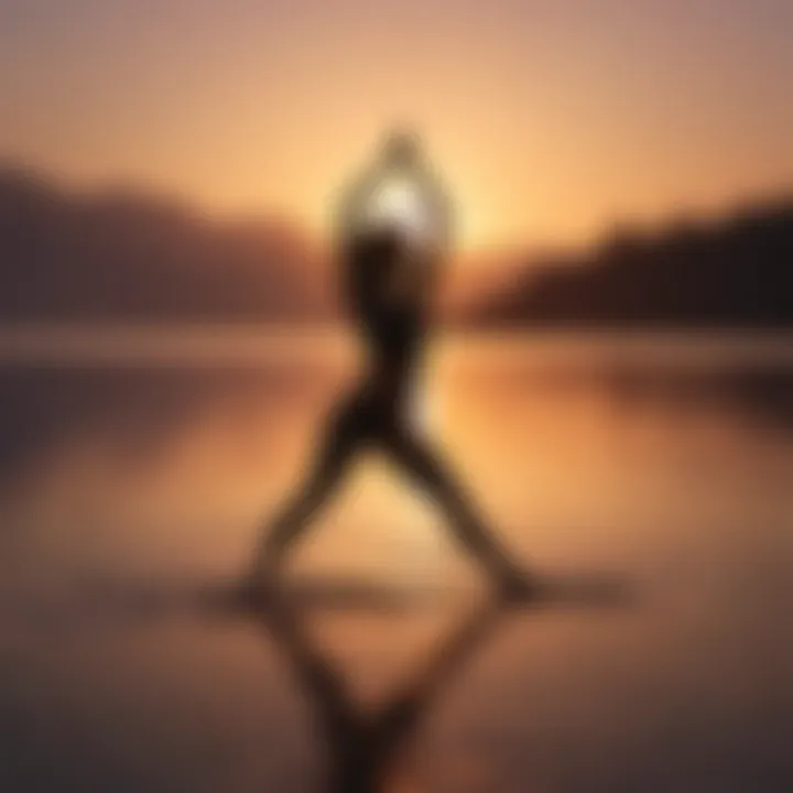 Silhouette of person in yoga pose at sunrise