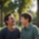 A serene moment of a father and son sharing laughter in a park.