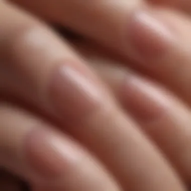 Close-up view of healthy fingernails showcasing a smooth and shiny surface.