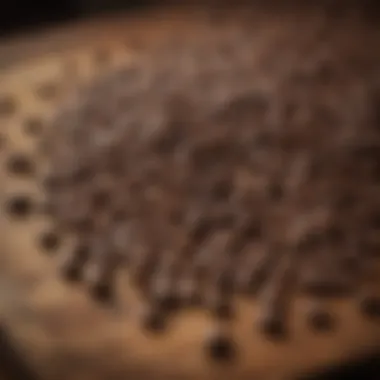 Coffee beans scattered on rustic wooden table