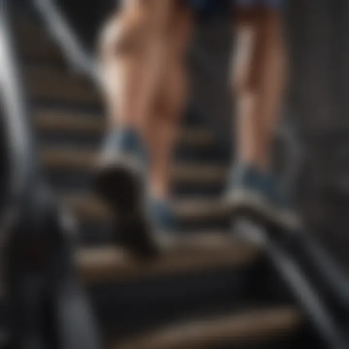 Close-up of a pair of feet stepping on a stair climber machine