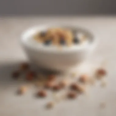 Creamy Greek Yogurt with Crunchy Nutty Toppings Bowl of Greek yogurt topped with nuts and seeds