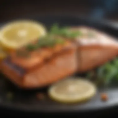 Plate of grilled salmon with lemon and herbs