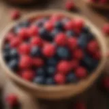 Fresh organic berries in a wooden bowl