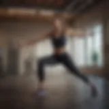 Woman performing dynamic stretching exercise before workout