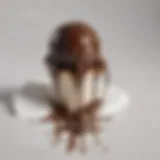 Dark chocolate melting on a white shirt fabric