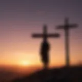 Silhouetted figure watching sunset with cross in background