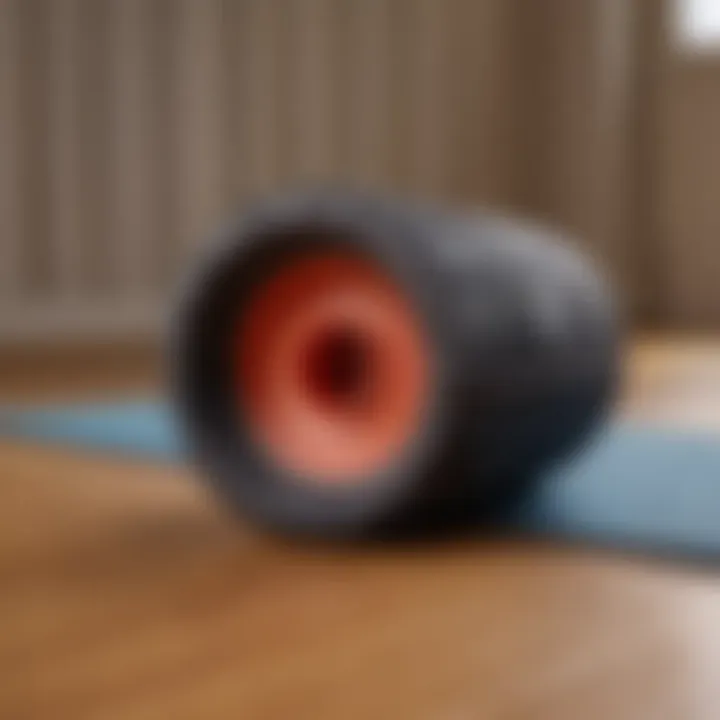 Close-up of a foam roller on a yoga mat