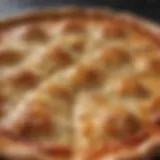 A close-up of a golden-brown cheese pizza with bubbling cheese