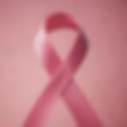 Close-up of a breast cancer awareness ribbon against a vibrant background