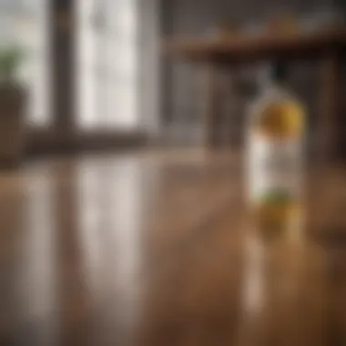 A variety of natural cleaning agents, including vinegar, displayed on a wooden surface.