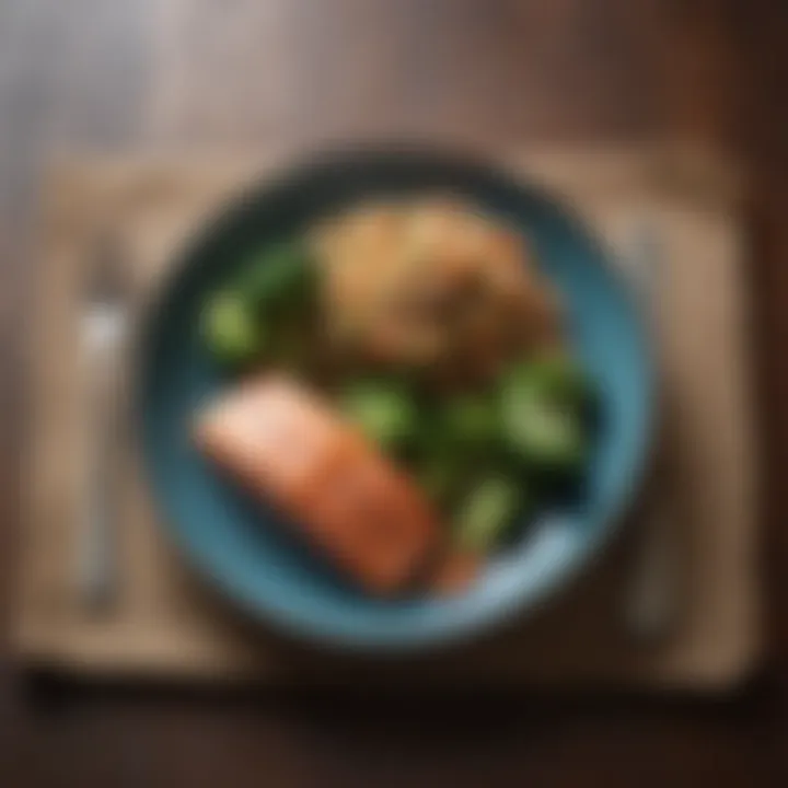 A neatly portioned meal featuring salmon, quinoa, and steamed broccoli.