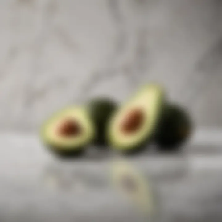 Creamy avocado sliced on a marble countertop